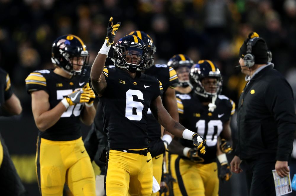 Iowa Hawkeyes wide receiver Ihmir Smith-Marsette (6) signals for a first town after a catch against the Northwestern Wildcats Saturday, November 10, 2018 at Kinnick Stadium. (Brian Ray/hawkeyesports.com)