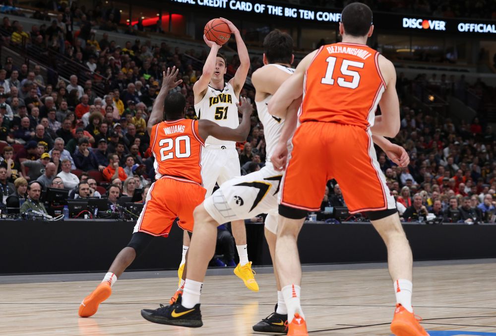 Iowa Hawkeyes forward Nicholas Baer (51) against the Illinois Fighting Illini in the 2019 Big Ten Men's Basketball Tournament Thursday, March 14, 2019 at the United Center in Chicago. (Brian Ray/hawkeyesports.com)
