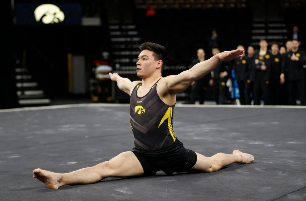 Brandon Wong competes on the floor against Minnesota and Air Force 