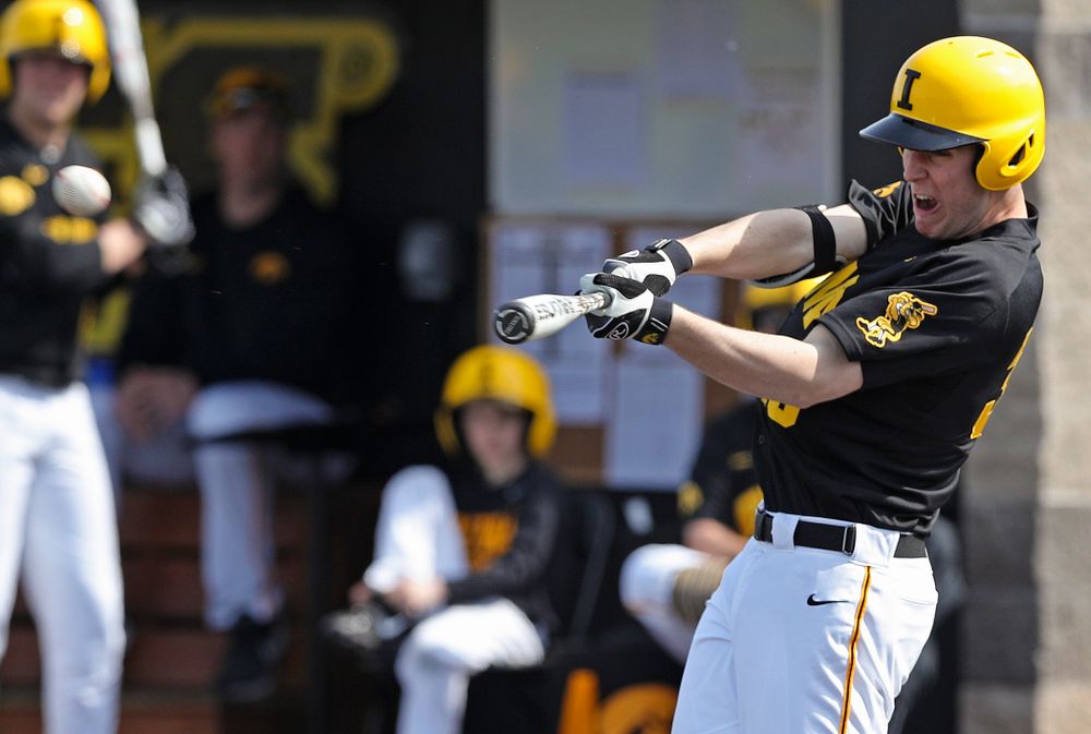 Iowa Hawkeyes right fielder Connor McCaffery (30) hits a double during the fourth inning of their game against Rutgers at Duane Banks Field in Iowa City on Saturday, Apr. 6, 2019. (Stephen Mally/hawkeyesports.com)