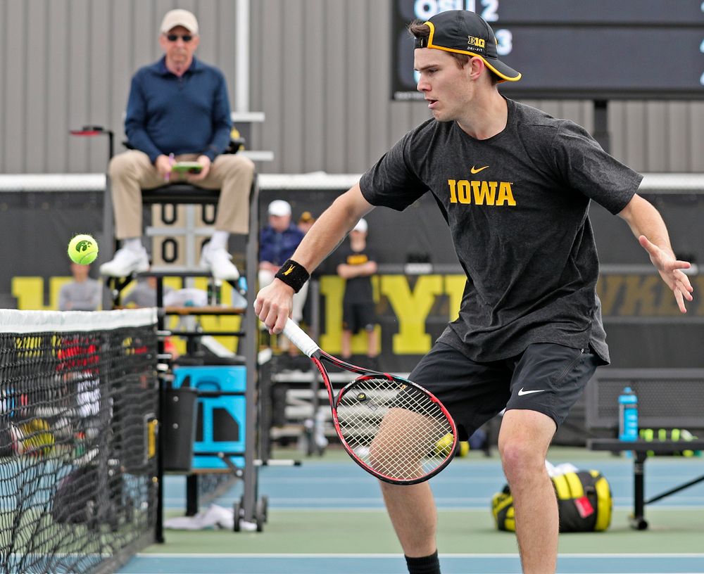 Iowa's Jonas Larsen plays at the net during a double match against Ohio State at the Hawkeye Tennis and Recreation Complex in Iowa City on Sunday, Apr. 7, 2019. (Stephen Mally/hawkeyesports.com)