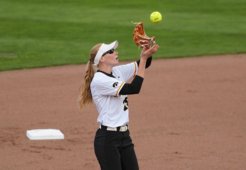 Iowa shortstop Ashley Hamilton (18) pulls in a pop fly for an out during the first inning of their game against Ohio State at Pearl Field in Iowa City on Friday, May. 3, 2019. (Stephen Mally/hawkeyesports.com)