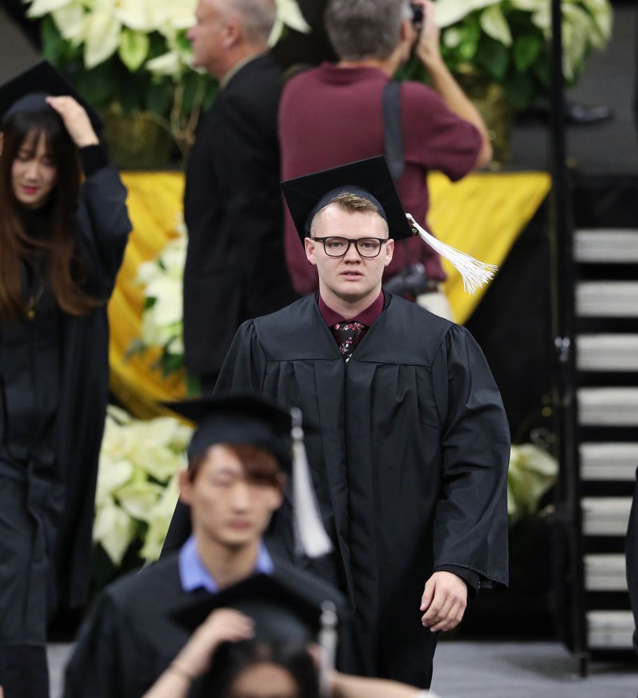Iowa Men's Basketball manager Lucas Pauley during the Fall Commencement Ceremony  Saturday, December 15, 2018 at Carver-Hawkeye Arena. (Brian Ray/hawkeyesports.com)