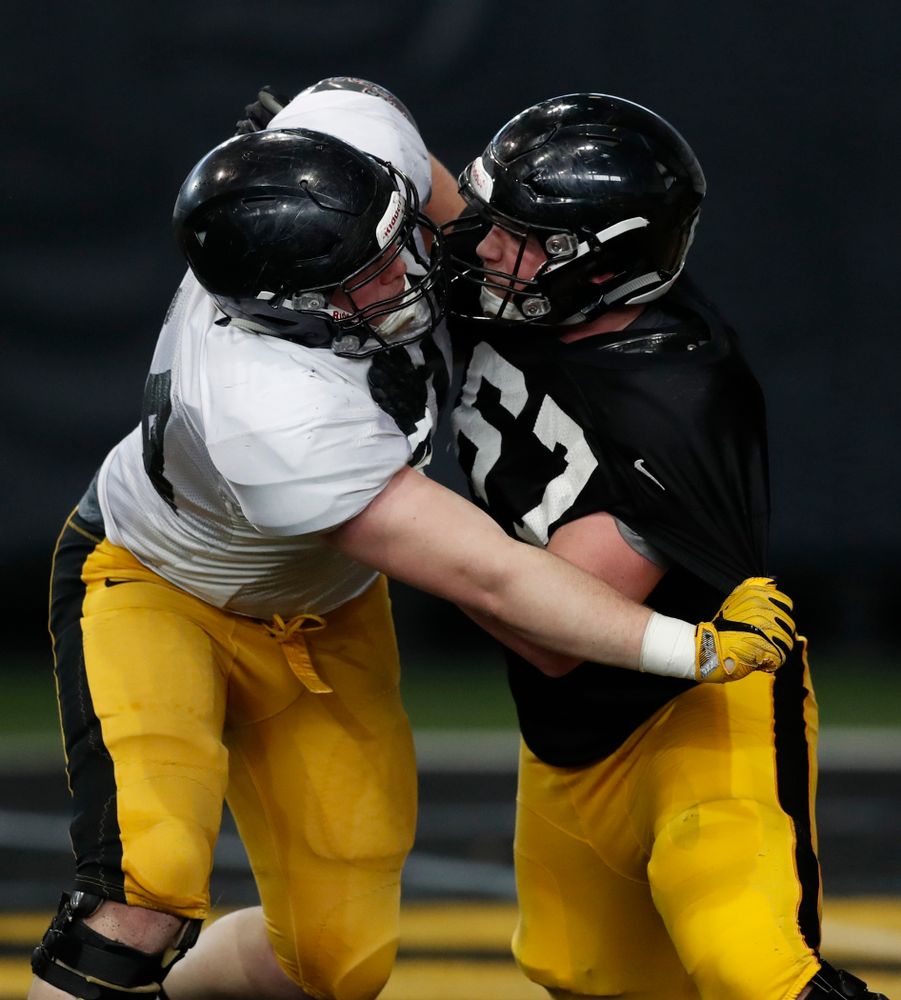 Iowa Hawkeyes offensive lineman Levi Duwa (67) and defensive end Austin Schulte (74)(74)during spring practice Wednesday, March 28, 2018 at the Hansen Football Performance Center.  (Brian Ray/hawkeyesports.com)