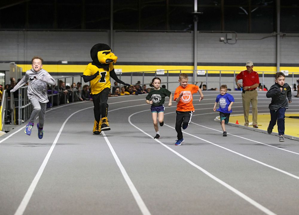 Young fan participate in the Herky Kid’s Race at the Black and Gold Invite at the Recreation Building in Iowa City on Saturday, February 1, 2020. (Stephen Mally/hawkeyesports.com)