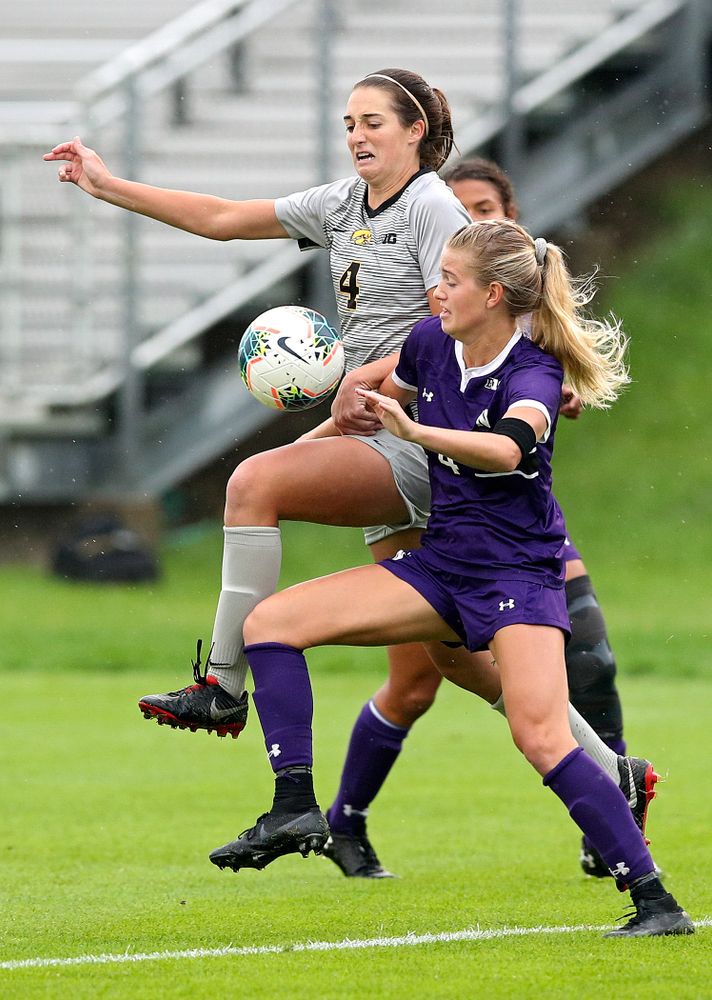 Iowa forward Kaleigh Haus (4) battles for position on the ball during the first half of their match at the Iowa Soccer Complex in Iowa City on Sunday, Sep 29, 2019. (Stephen Mally/hawkeyesports.com)