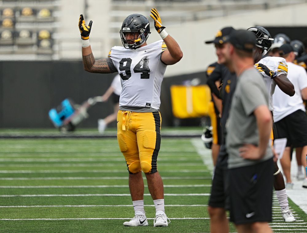 Iowa Hawkeyes defensive end A.J. Epenesa (94) signals that a field goal was good during Fall Camp Practice No. 8 at Kids Day at Kinnick Stadium in Iowa City on Saturday, Aug 10, 2019. (Stephen Mally/hawkeyesports.com)
