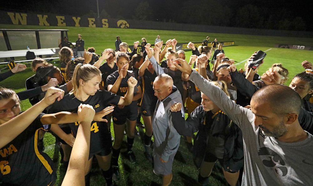 Iowa head coach Dave DiIanni huddles with his team after their match against Western Michigan at the Iowa Soccer Complex in Iowa City on Thursday, Aug 22, 2019. (Stephen Mally/hawkeyesports.com)