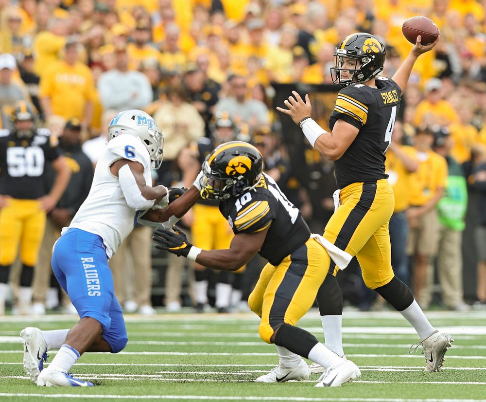 Iowa Hawkeyes quarterback Nate Stanley (4) throws a pass as running back Mekhi Sargent (10) blocks during the first quarter of their game at Kinnick Stadium in Iowa City on Saturday, Sep 28, 2019. (Stephen Mally/hawkeyesports.com)