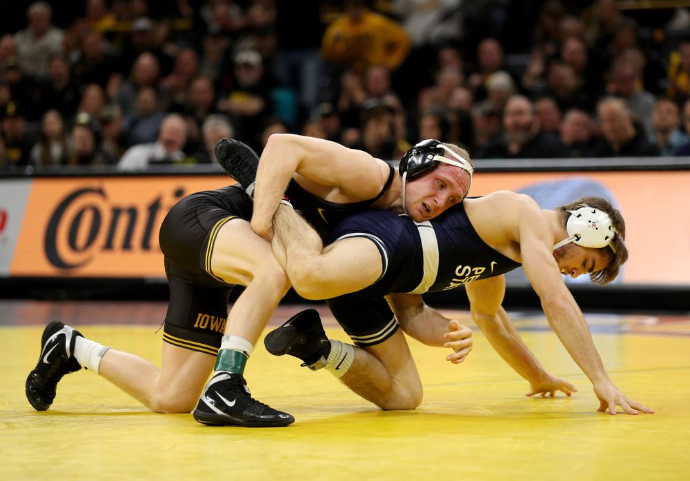 Iowa’s Kaleb Young wrestles Penn State’s Bo Pipher at 157 pounds Friday, January 31, 2020 at Carver-Hawkeye Arena. Young defeated Pipher 6-1. (Brian Ray/hawkeyesports.com)