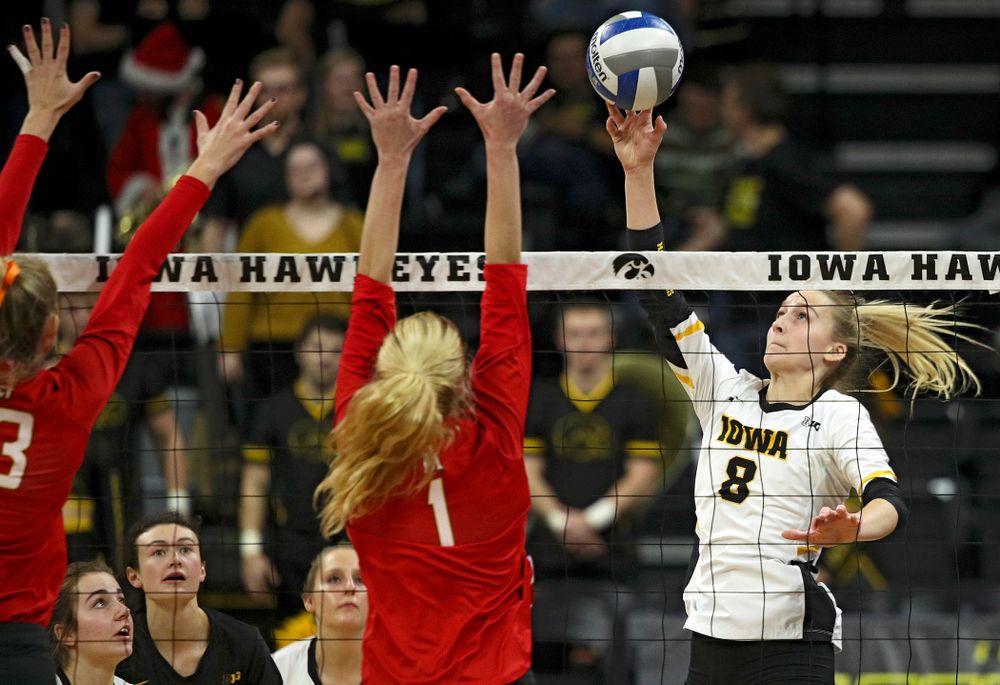 Iowa’s Kyndra Hansen (8) sends the ball over for a kill during the fourth set of their match at Carver-Hawkeye Arena in Iowa City on Saturday, Nov 30, 2019. (Stephen Mally/hawkeyesports.com)