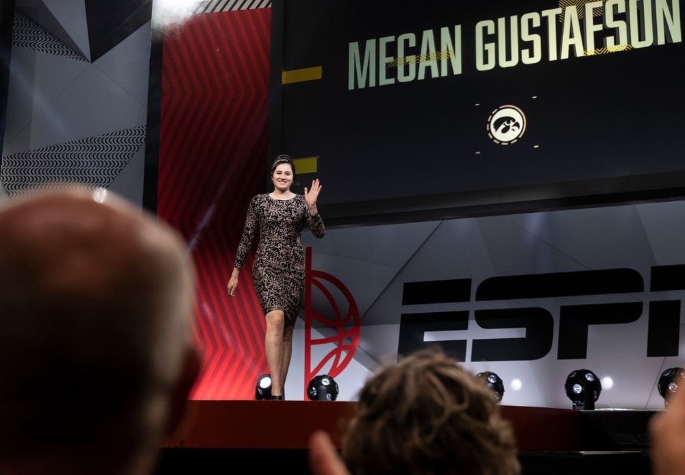 Iowa Hawkeyes forward Megan Gustafson (10) walks across the stage during the ESPN College Basketball Awards show Friday, April 12, 2019 at The Novo at LA Live.  (Brian Ray/hawkeyesports.com)