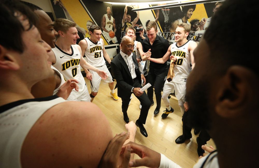 Iowa Hawkeyes assistant coach Sherman Dillard dances in the locker room following their victory over the Michigan Wolverines  Friday, February 1, 2019 at Carver-Hawkeye Arena. (Brian Ray/hawkeyesports.com)