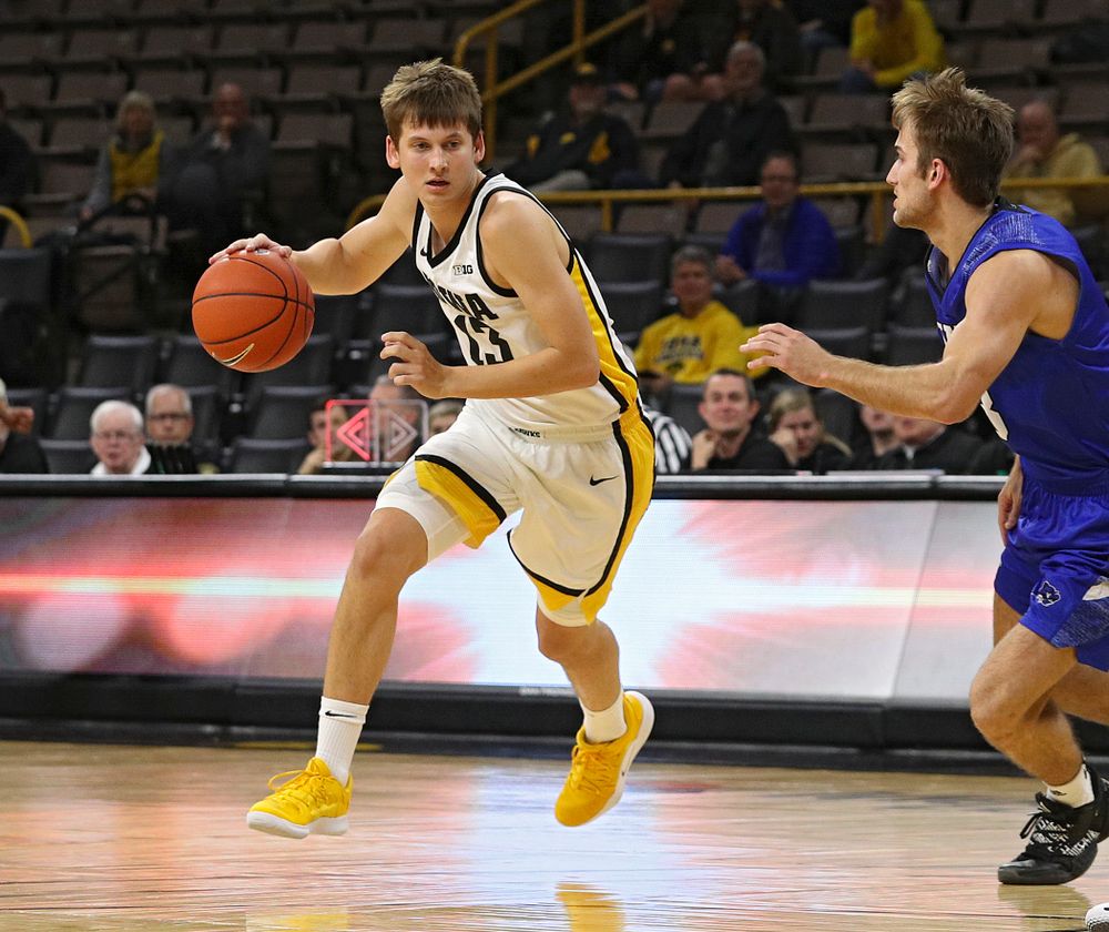 Iowa Hawkeyes guard Austin Ash (13) drives with the ball during the second half of their exhibition game against Lindsey Wilson College at Carver-Hawkeye Arena in Iowa City on Monday, Nov 4, 2019. (Stephen Mally/hawkeyesports.com)
