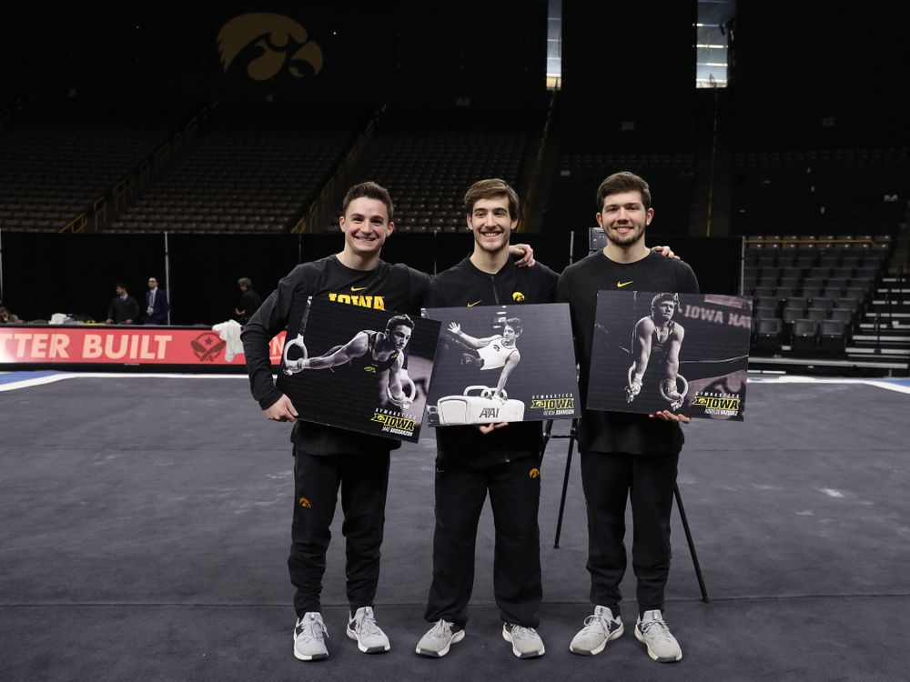 Iowa Men's Gymnastics seniors Jake Brodarzon, Kevin Johnson, and Rogelio Vazquez during senior day ceremonies following their meet against the Ohio State Buckeyes  Saturday, March 16, 2019 at Carver-Hawkeye Arena.  (Brian Ray/hawkeyesports.com)