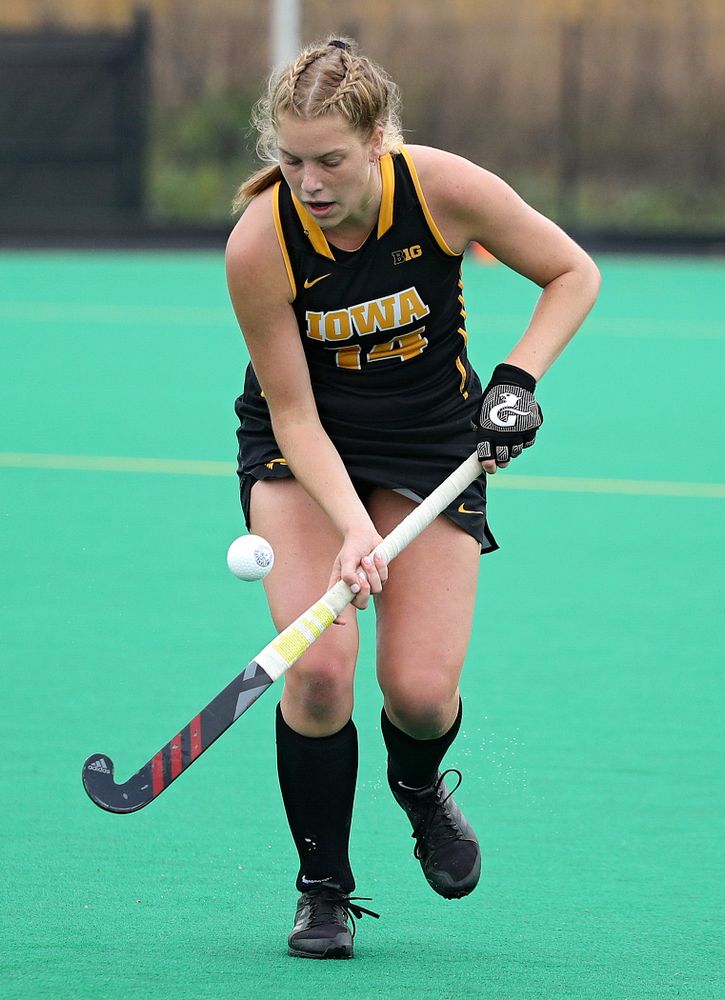 Iowa’s Lokke Stribos (14) bounces the ball on her stick during the second quarter of their game at Grant Field in Iowa City on Saturday, Oct 26, 2019. (Stephen Mally/hawkeyesports.com)