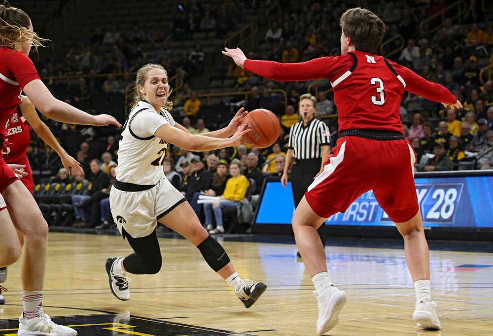 Iowa Hawkeyes guard Kathleen Doyle (22) passes the ball to guard Alexis Sevillian (not pictured) for an assist as Sevillian made a 3-pointer during the first quarter of the game at Carver-Hawkeye Arena in Iowa City on Thursday, February 6, 2020. (Stephen Mally/hawkeyesports.com)