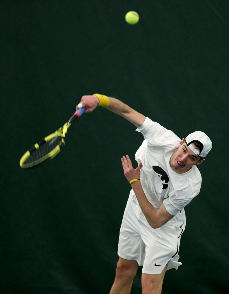 Iowa’s Nikita Snezhko against Cornell Sunday, March 8, 2020 at the Hawkeye Tennis and Recreation Center. (Brian Ray/hawkeyesports.com)