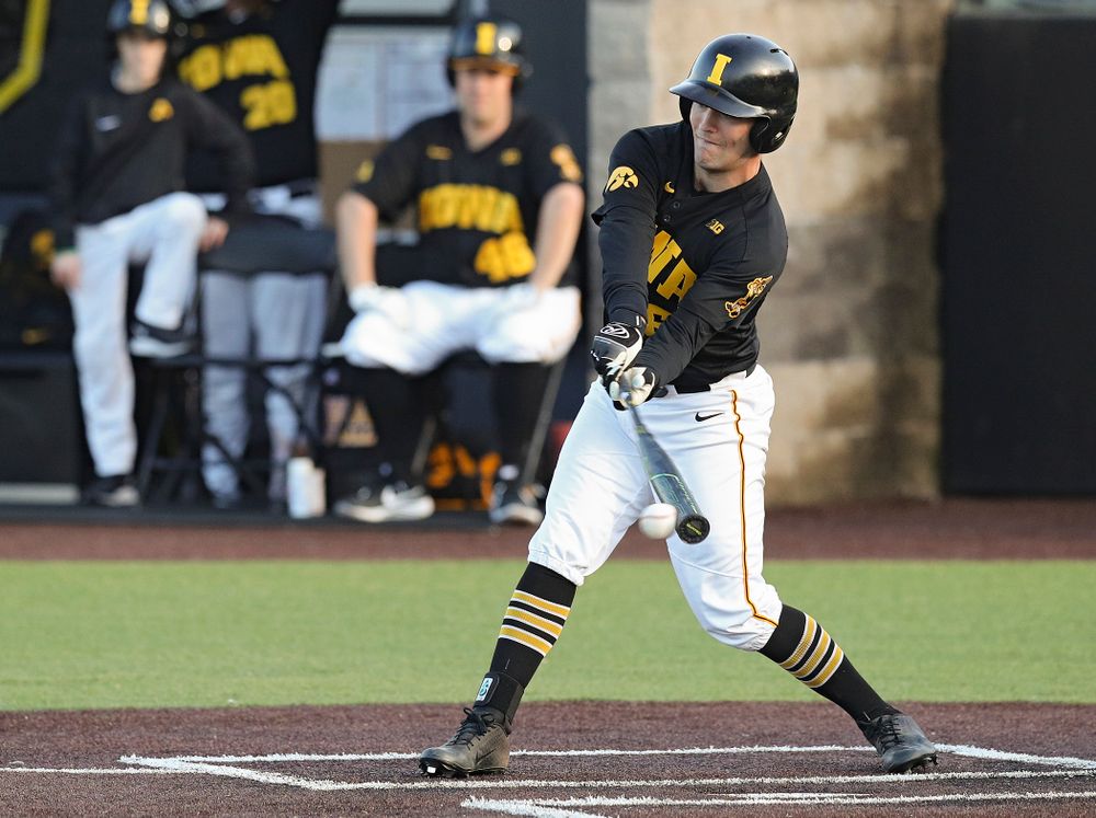 Iowa outfielder Justin Jenkins (6) bats during the fifth inning of their college baseball game at Duane Banks Field in Iowa City on Tuesday, March 10, 2020. (Stephen Mally/hawkeyesports.com)