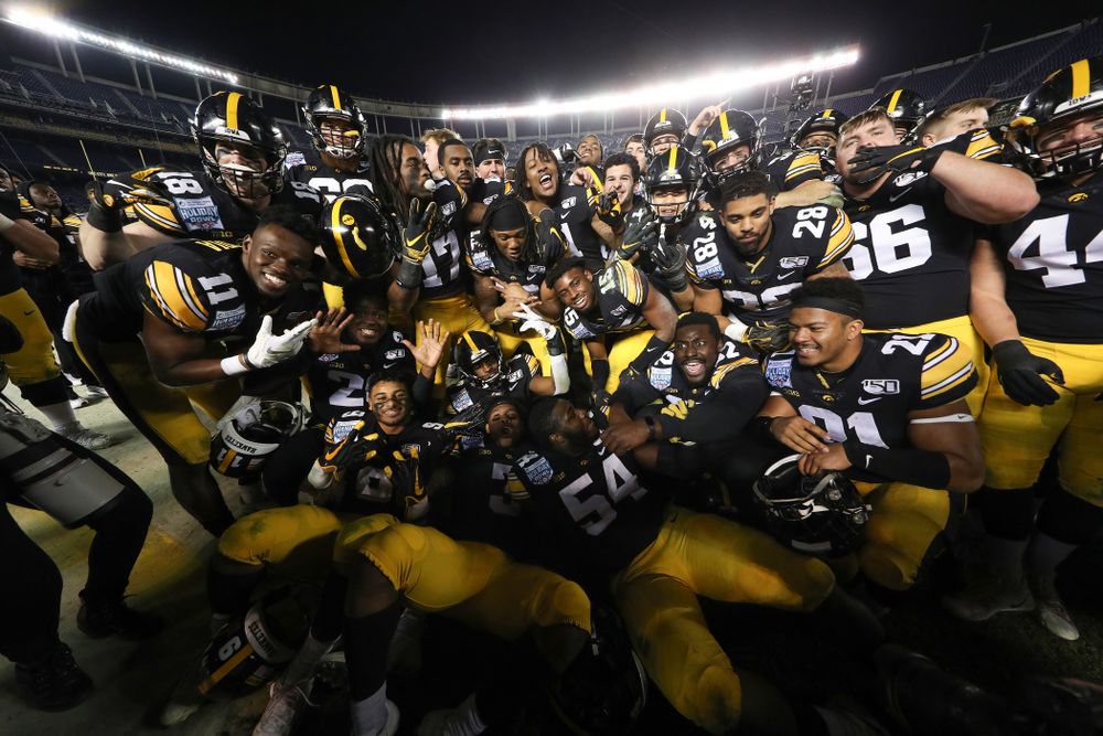 The Iowa Hawkeyes celebrate their win against USC in the Holiday Bowl Friday, December 27, 2019 at San Diego Community Credit Union Stadium.  (Brian Ray/hawkeyesports.com)