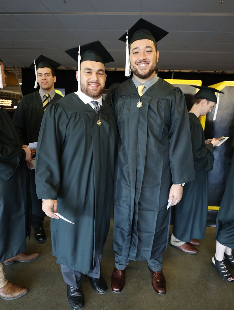 Iowa Football's Austin Kelly and Dalton Ferguson during the Fall Commencement Ceremony  Saturday, December 15, 2018 at Carver-Hawkeye Arena. (Brian Ray/hawkeyesports.com)