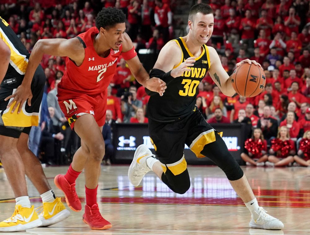 Iowa Hawkeyes guard Connor McCaffery (30) drives with the ball during their game at the Xfinity Center in College Park, MD on Thursday, January 30, 2020. (University of Maryland Athletics)