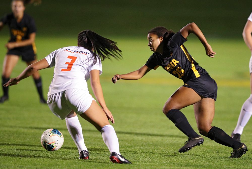 Iowa midfielder/forward Melina Hegelheimer (26) tries to get around a defender during the first half of their match against Illinois at the Iowa Soccer Complex in Iowa City on Thursday, Sep 26, 2019. (Stephen Mally/hawkeyesports.com)
