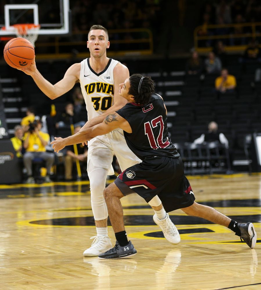 Iowa Hawkeyes guard Connor McCaffery (30) passes the ball during a game against Guilford College at Carver-Hawkeye Arena on November 4, 2018. (Tork Mason/hawkeyesports.com)