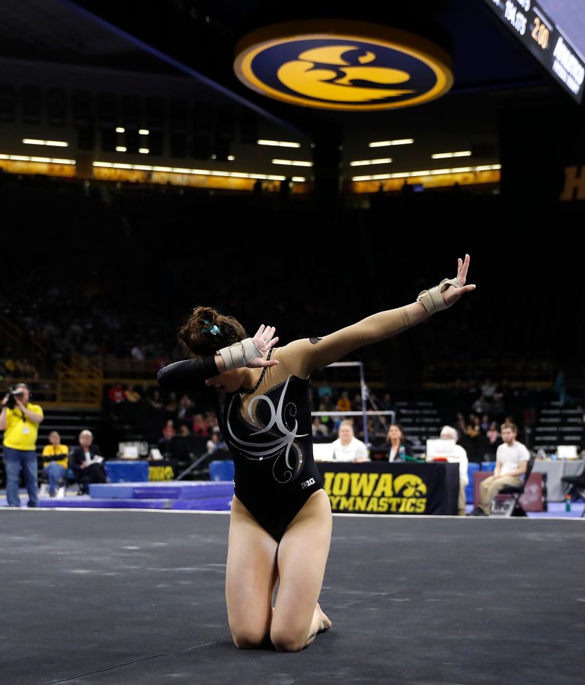 Iowa's Lanie Snyder competes on the floor against the Nebraska Cornhuskers 