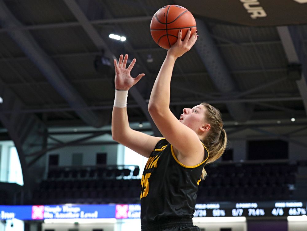 Iowa Hawkeyes forward Monika Czinano (25) makes a basket during the third quarter of their game at Welsh-Ryan Arena in Evanston, Ill. on Sunday, January 5, 2020. (Stephen Mally/hawkeyesports.com)