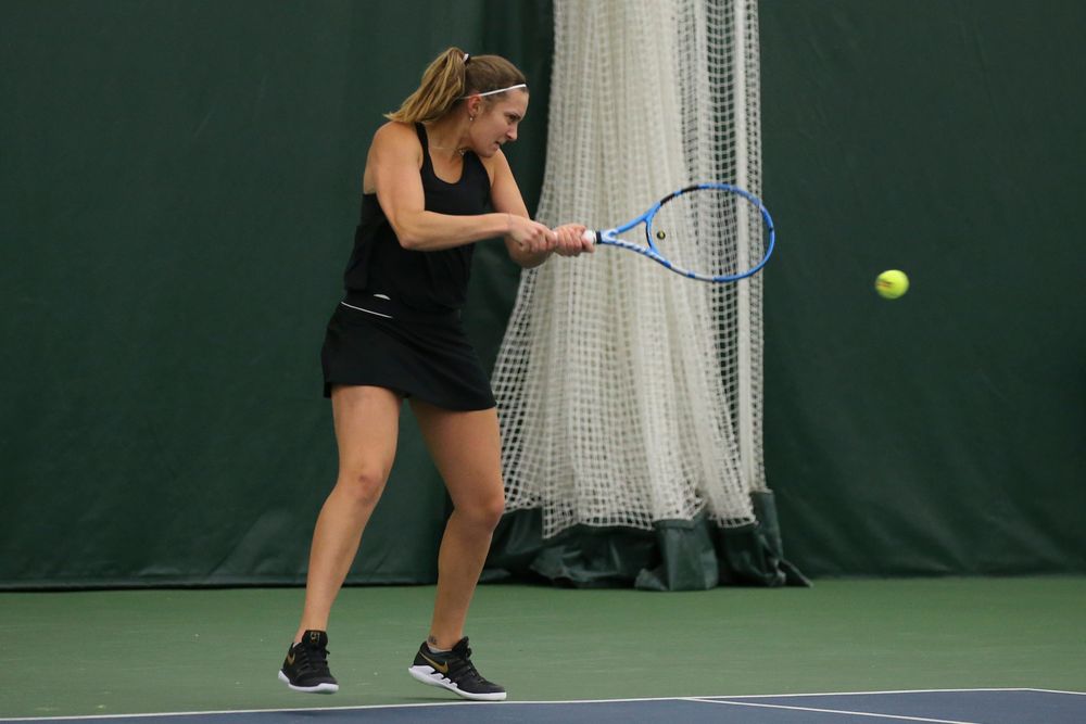 Iowa’s Ashleigh Jacobs returns a ball during the Iowa women’s tennis meet vs UNI  on Saturday, February 29, 2020 at the Hawkeye Tennis and Recreation Complex. (Lily Smith/hawkeyesports.com)