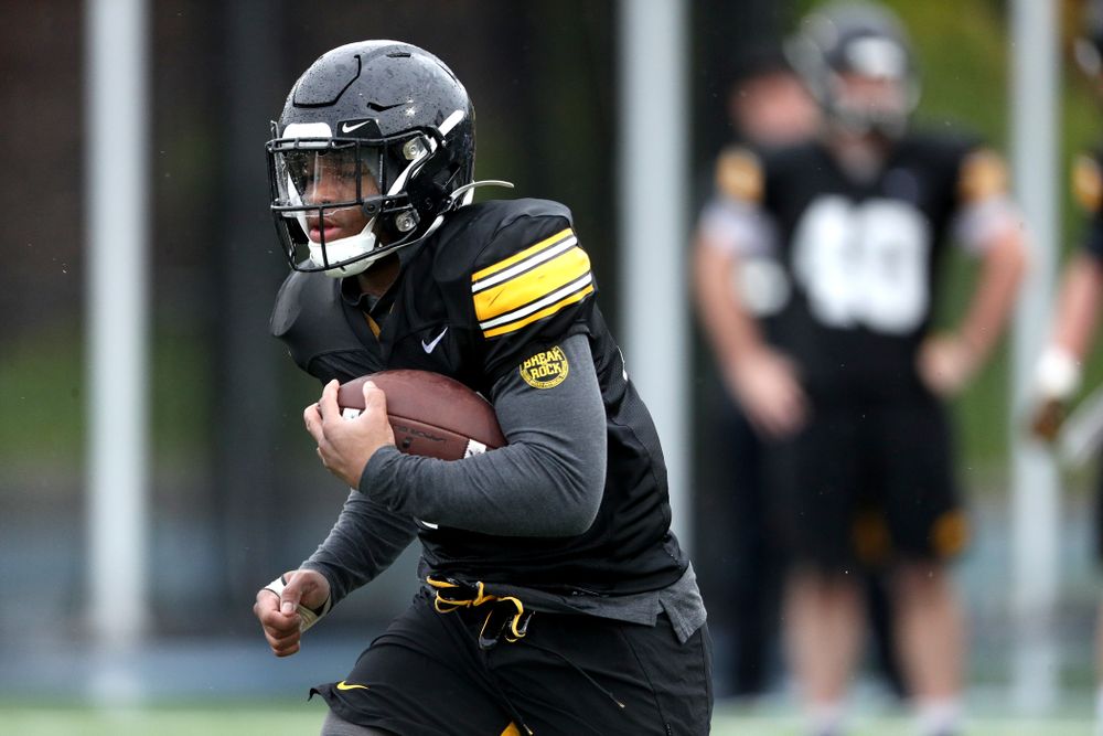 Iowa Hawkeyes running back Mekhi Sargent (10) carrels the ball during practice Monday, December 23, 2019 at Mesa College in San Diego. (Brian Ray/hawkeyesports.com)