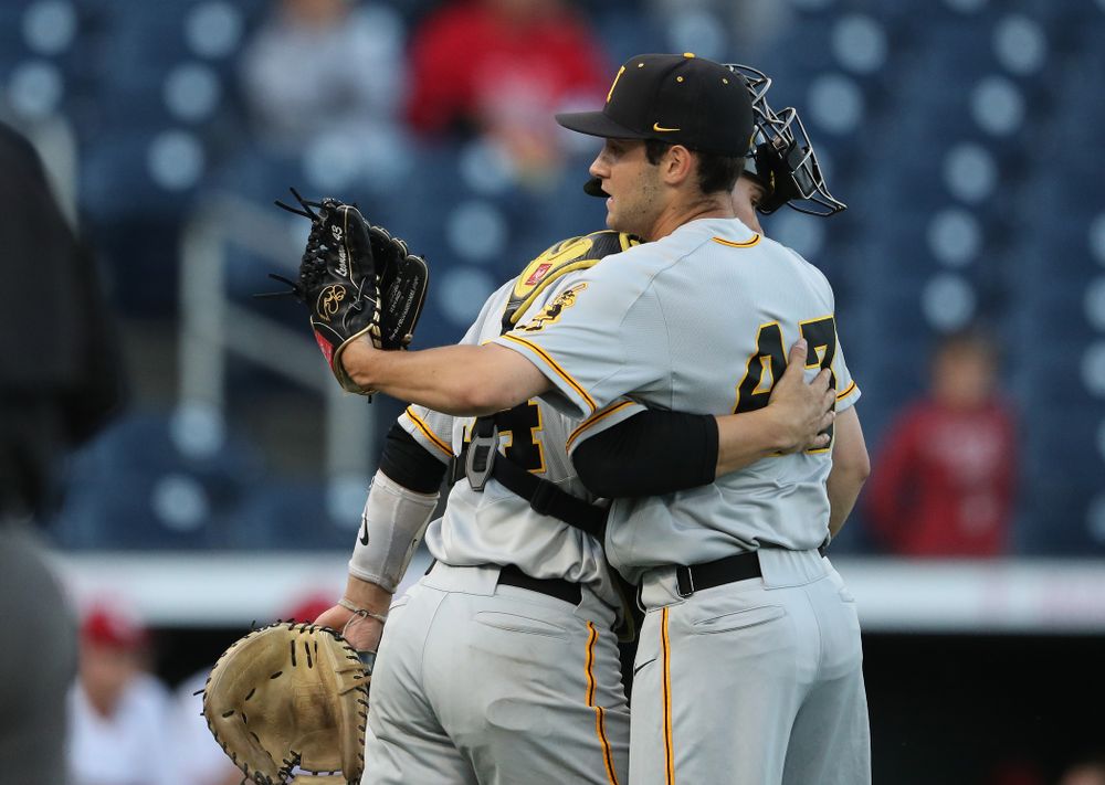 Iowa Hawkeyes Grant Leonard (43) and catcher Austin Martin (34) against the Indiana Hoosiers in the first round of the Big Ten Baseball Tournament Wednesday, May 22, 2019 at TD Ameritrade Park in Omaha, Neb. (Brian Ray/hawkeyesports.com)