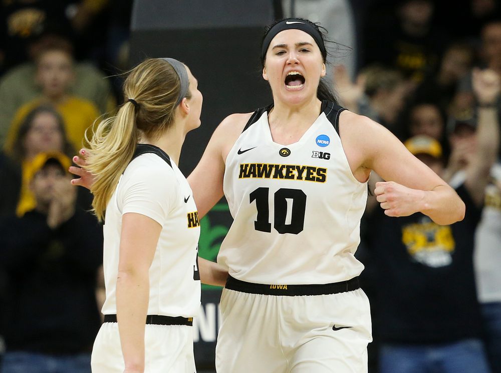 Iowa Hawkeyes guard Makenzie Meyer (3) and center Megan Gustafson (10) are pumped up during the fourth quarter of their second round game in the 2019 NCAA Women's Basketball Tournament at Carver Hawkeye Arena in Iowa City on Sunday, Mar. 24, 2019. (Stephen Mally for hawkeyesports.com)