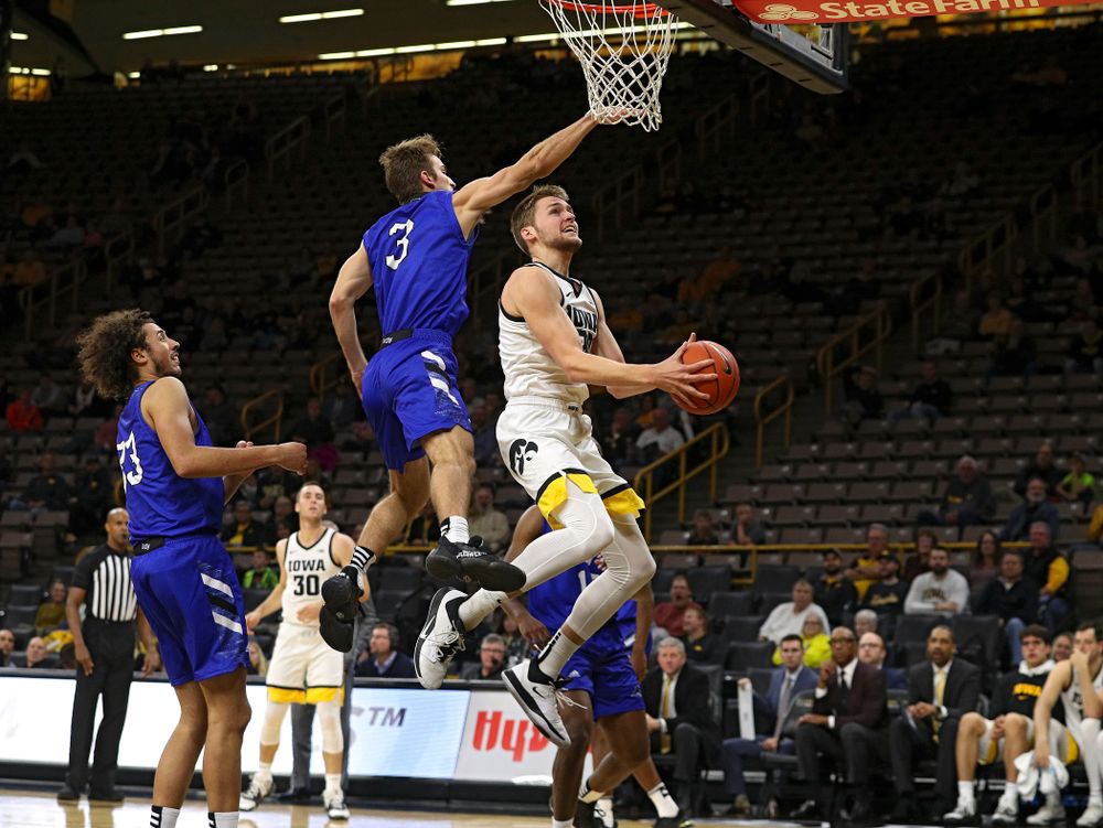 Iowa Hawkeyes forward Riley Till (20) puts up a shot during the second half of their exhibition game against Lindsey Wilson College at Carver-Hawkeye Arena in Iowa City on Monday, Nov 4, 2019. (Stephen Mally/hawkeyesports.com)