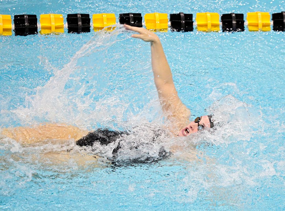 Iowa’s Georgia Clark swims the women’s 100-yard backstroke event during their meet against Michigan State and Northern Iowa at the Campus Recreation and Wellness Center in Iowa City on Friday, Oct 4, 2019. (Stephen Mally/hawkeyesports.com)