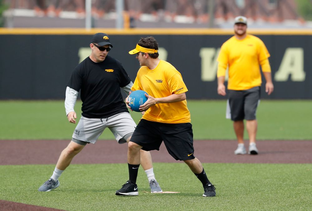 Asst. Director Compliance Henry Archuleta and director of Football New Media Max Allen during the Iowa Student Athlete Kickoff Kickball game  Sunday, August 19, 2018 at Duane Banks Field. (Brian Ray/hawkeyesports.com)