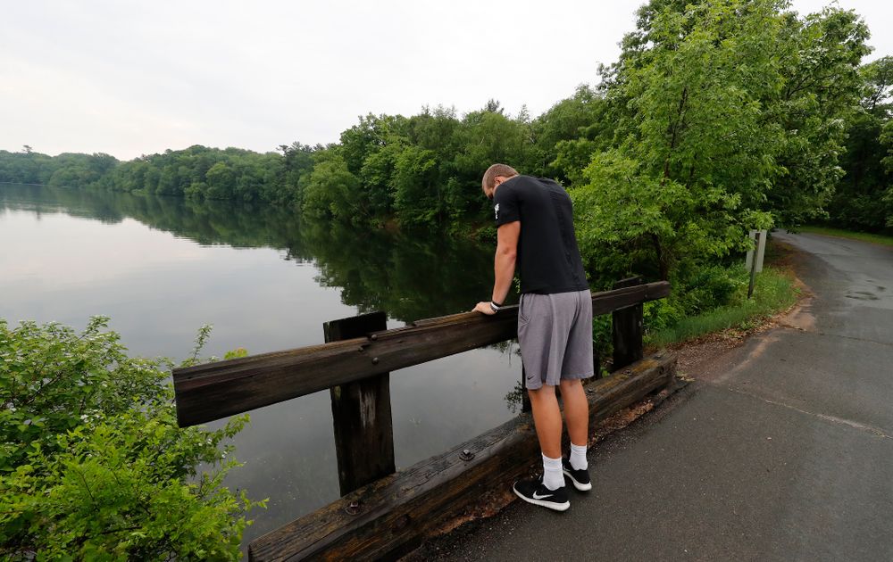 Iowa Hawkeyes quarterback Nathan Stanley (4) looks over the lake where he likes to fish with his friends Wednesday, May 30, 2018 in Menomonie, Wisc. (Brian Ray/hawkeyesports.com)