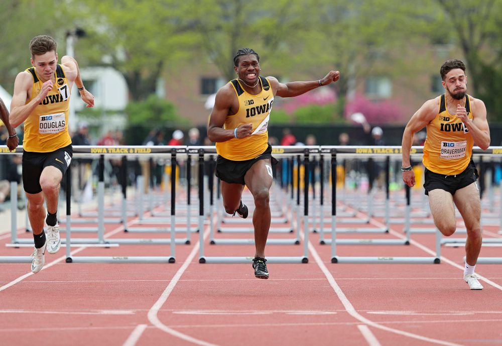 Iowa's Chris Douglas (from left), Anthony Williams, and Josh Braverman run the men’s 110 meter hurdles event on the third day of the Big Ten Outdoor Track and Field Championships at Francis X. Cretzmeyer Track in Iowa City on Sunday, May. 12, 2019. (Stephen Mally/hawkeyesports.com)