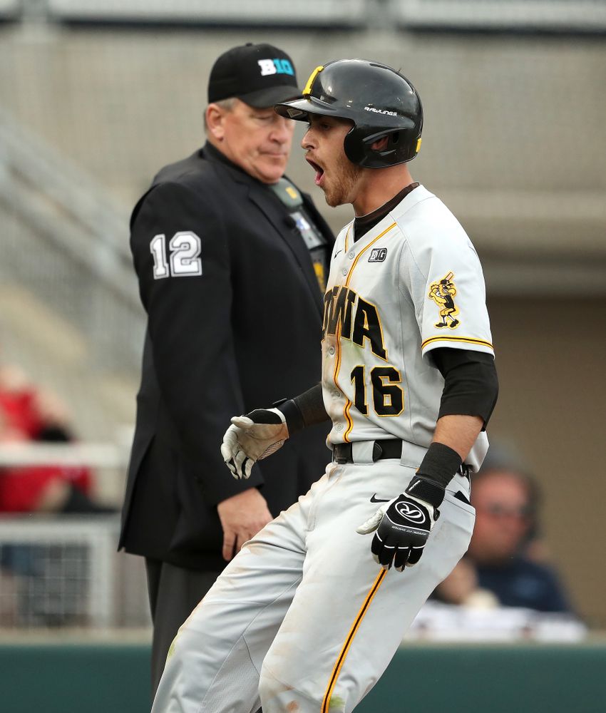 Iowa Hawkeyes Tanner Wetrich (16) reacts after scoring against the Indiana Hoosiers in the first round of the Big Ten Baseball Tournament Wednesday, May 22, 2019 at TD Ameritrade Park in Omaha, Neb. (Brian Ray/hawkeyesports.com)
