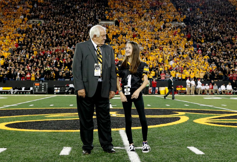 Honorary Captain Tom Moore and Kid Captain Kiersten Mann before the Iowa Hawkeyes game against the Wisconsin Badgers Saturday, September 22, 2018 at Kinnick Stadium. (Brian Ray/hawkeyesports.com)