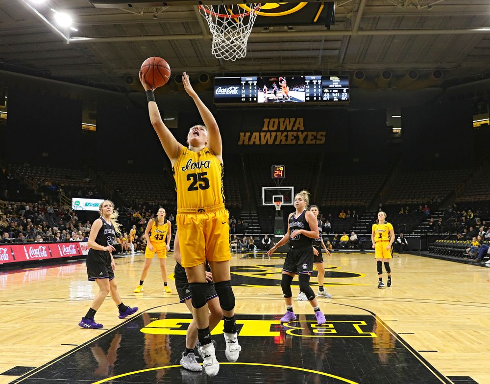 Iowa forward/center Monika Czinano (25) makes a basket during the second quarter of their game against Winona State at Carver-Hawkeye Arena in Iowa City on Sunday, Nov 3, 2019. (Stephen Mally/hawkeyesports.com)