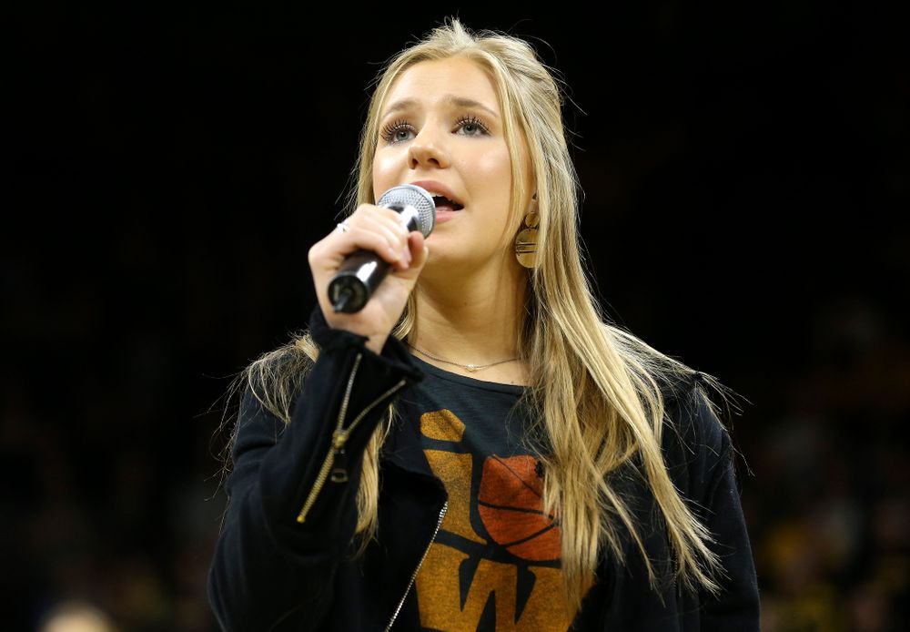 Emma Bluder sings the National Anthem before their second round game in the 2019 NCAA Women's Basketball Tournament at Carver Hawkeye Arena in Iowa City on Sunday, Mar. 24, 2019. (Stephen Mally for hawkeyesports.com)