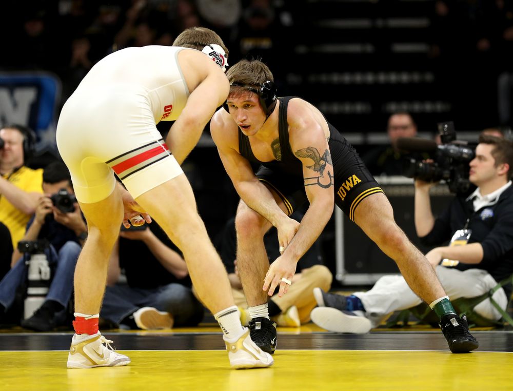 Iowa’s Cash Wilcke wrestles Ohio State’s Kollin Moore at 197 pounds Friday, January 24, 2020 at Carver-Hawkeye Arena. Moore won the match 8-3. (Brian Ray/hawkeyesports.com)