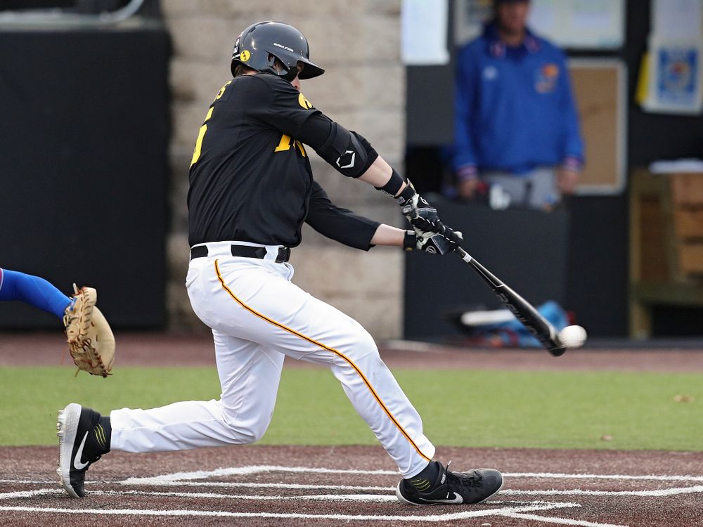 Iowa first baseman Peyton Williams (45) drives in a run with a hit during the eighth inning of their college baseball game at Duane Banks Field in Iowa City on Tuesday, March 10, 2020. (Stephen Mally/hawkeyesports.com)