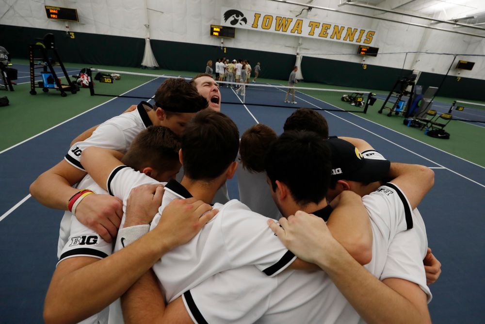 Iowa's Jake Jacoby pumps up his teammates before their match against Purdue Sunday, April 15, 2018 at the Hawkeye Tennis and Recreation Center. (Brian Ray/hawkeyesports.com)