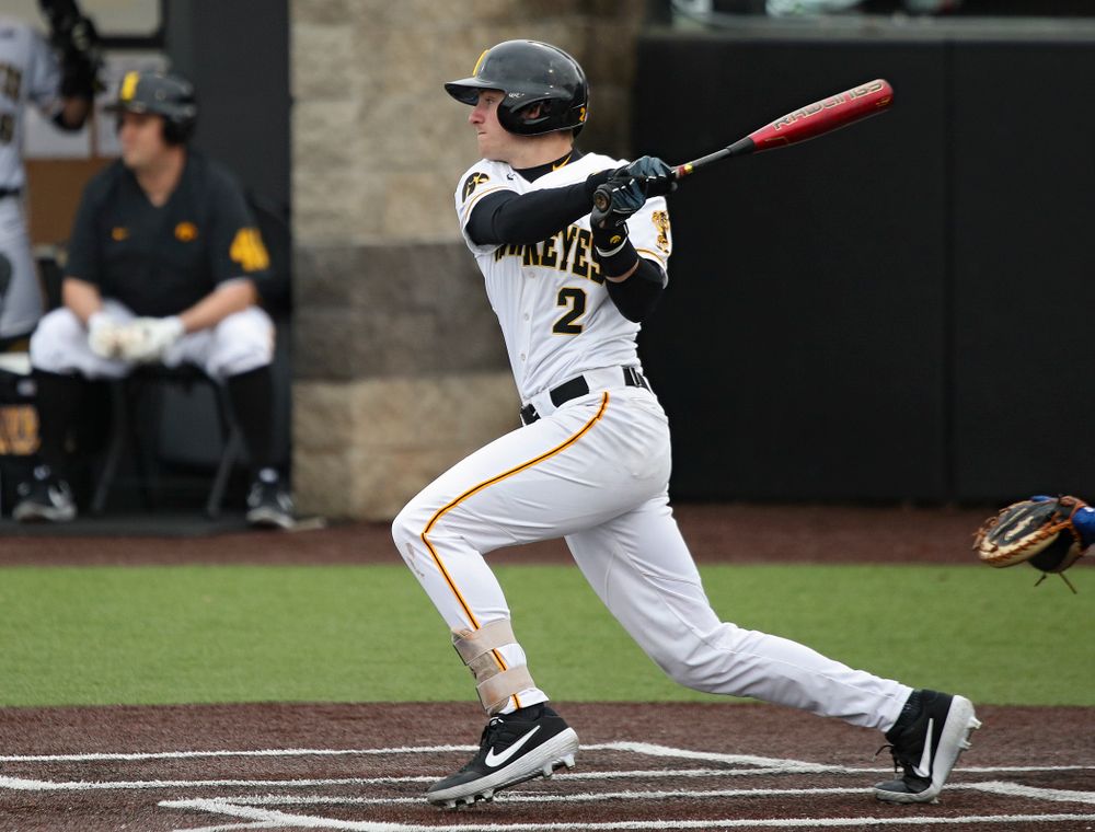 Iowa infielder Brendan Sher (2) hits an RBI single during the fourth inning of their college baseball game at Duane Banks Field in Iowa City on Wednesday, March 11, 2020. (Stephen Mally/hawkeyesports.com)