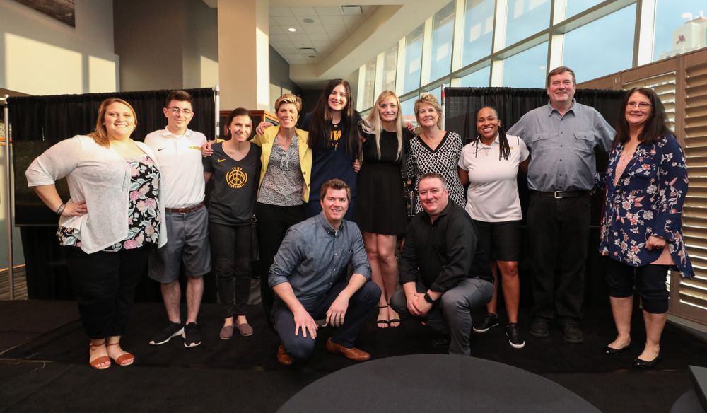 Iowa Hawkeyes forward and AP Player of the Year Megan Gustafson (10) and the Iowa Women's Basketball Staff following a news conference Thursday, April 4, 2019 at Amalie Arena in Tampa, FL. (Brian Ray/hawkeyesports.com)