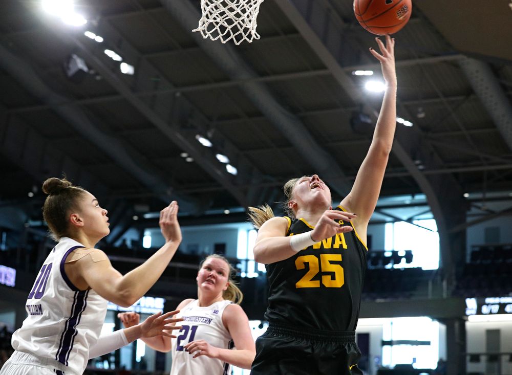 Iowa Hawkeyes forward Monika Czinano (25) scores a basket during the second quarter of their game at Welsh-Ryan Arena in Evanston, Ill. on Sunday, January 5, 2020. (Stephen Mally/hawkeyesports.com)