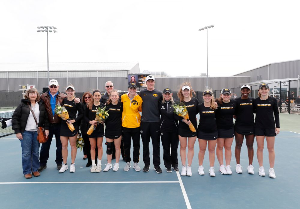 Iowa seniors Montana Crawford, Zoe Douglas, Adrienne Jensen, and Anastasia Reimchen during Senior Day activities before their match against the Wisconsin Badgers Sunday, April 22, 2018 at the Hawkeye Tennis and Recreation Center. (Brian Ray/hawkeyesports.com)